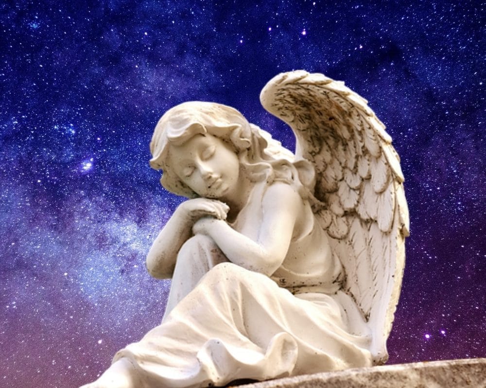 alt="angel in night sky"