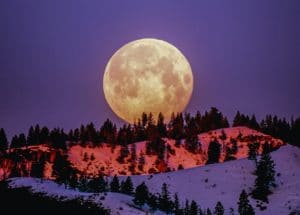 alt="full moon with purple background"