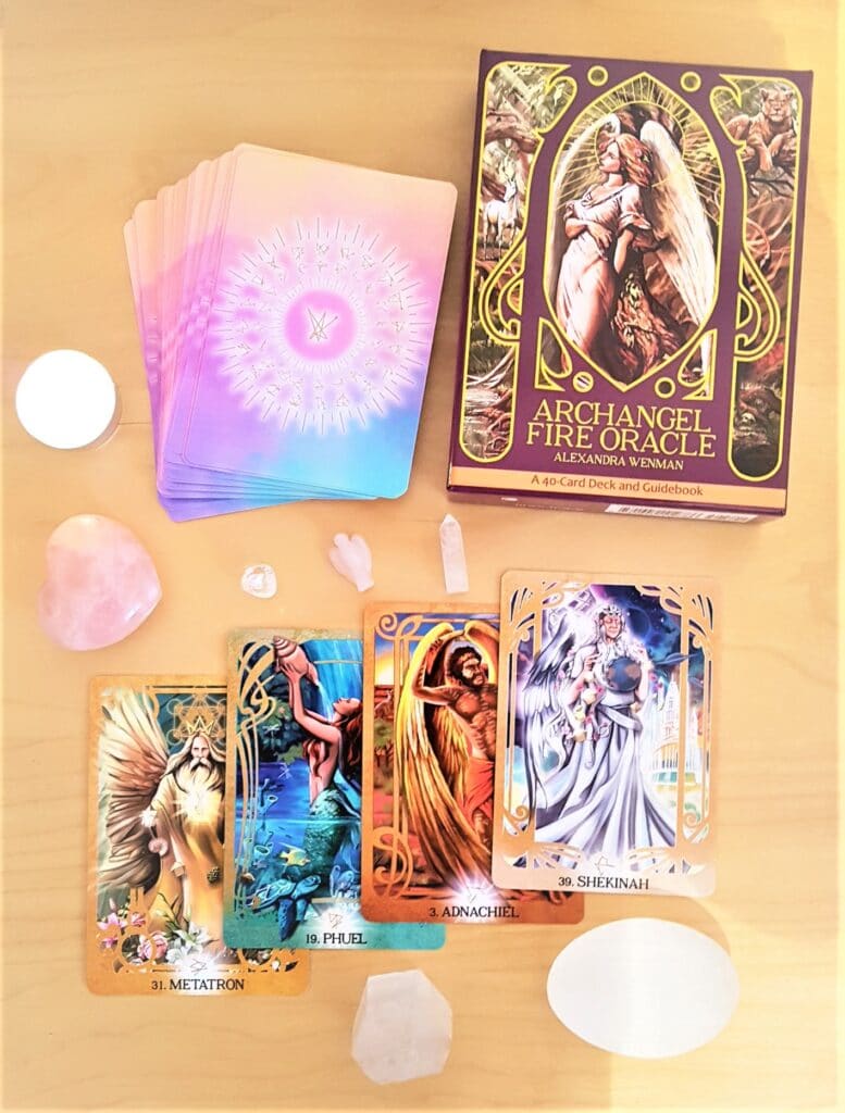 alt= 'Archangel Fire Oracle Deck flat lay with crystals'